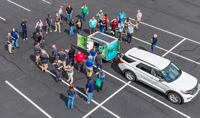 Alloway Envirogo Trailer in a parking lot giving a presentation to customers