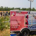 EnviroGo trailer sitting in cornfield with students